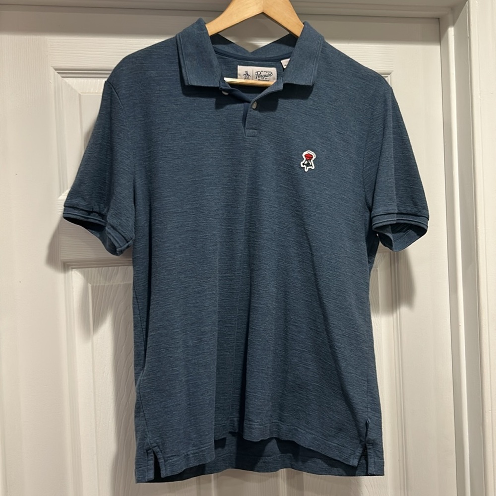 Original Penguin Men’s Polo Shirt in Blue with BBQ Grill Logo